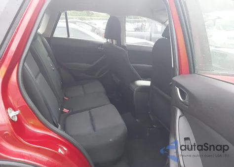 2015 Mazda Cx-5 Sport z USA, uszkodzony, nr VIN JM3KE4BY0F0551002